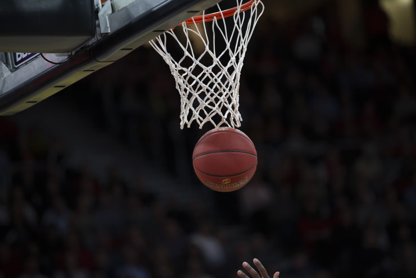 a basketball being thrown at a hoop