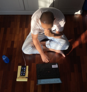 Man using a laptop for online sports betting