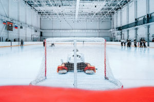 Players inside an ice hockey rink