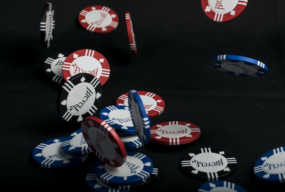 Poker chips falling on the table