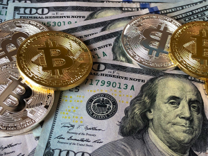 bitcoins-and-us-dollar-bills