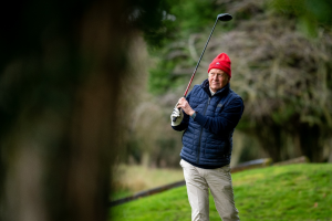 a man golfing