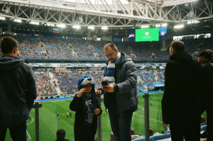 A man and his son at a game