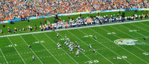 NFL players on the green field during the game