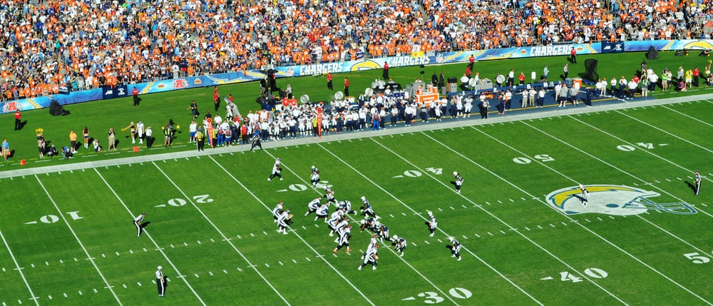 NFL players on the green field during the game
