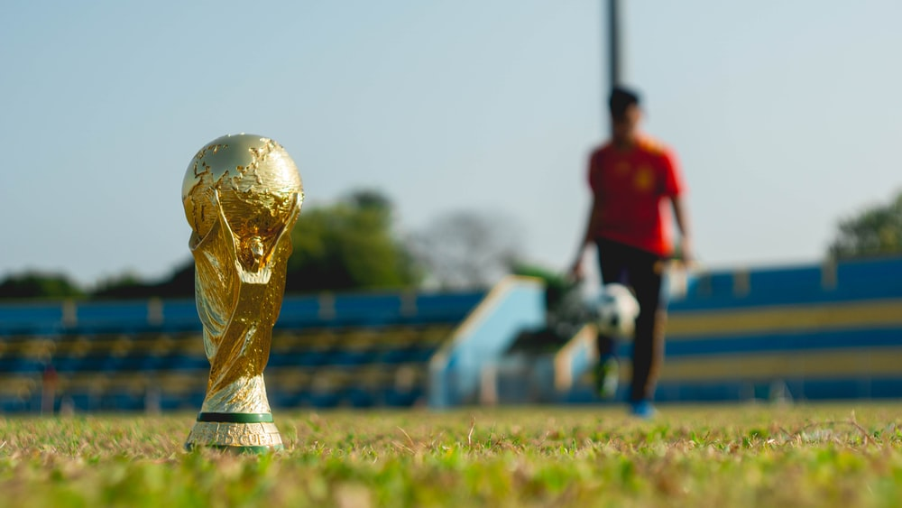 Golden trophy on grass