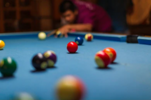 Man playing snooker