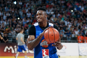 NBA player holding the ball in the court