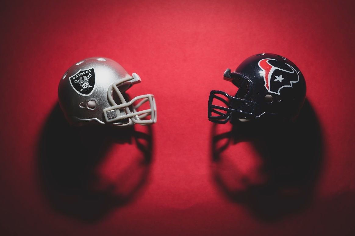 NFL team helmets on the ground.