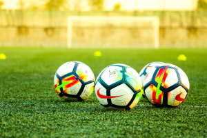 footballs in a field