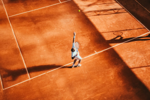 A tennis player during a serve