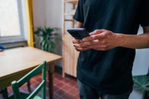 A punter checking the payment security of a cricket betting app
