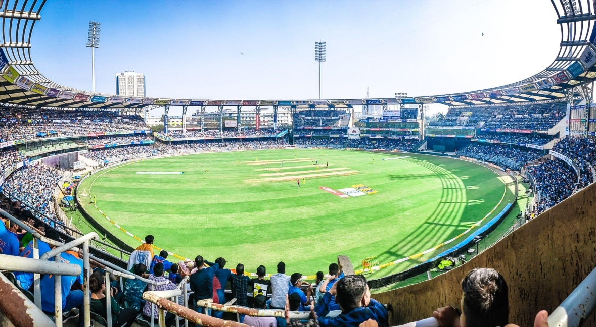 A cricket ground during the day.