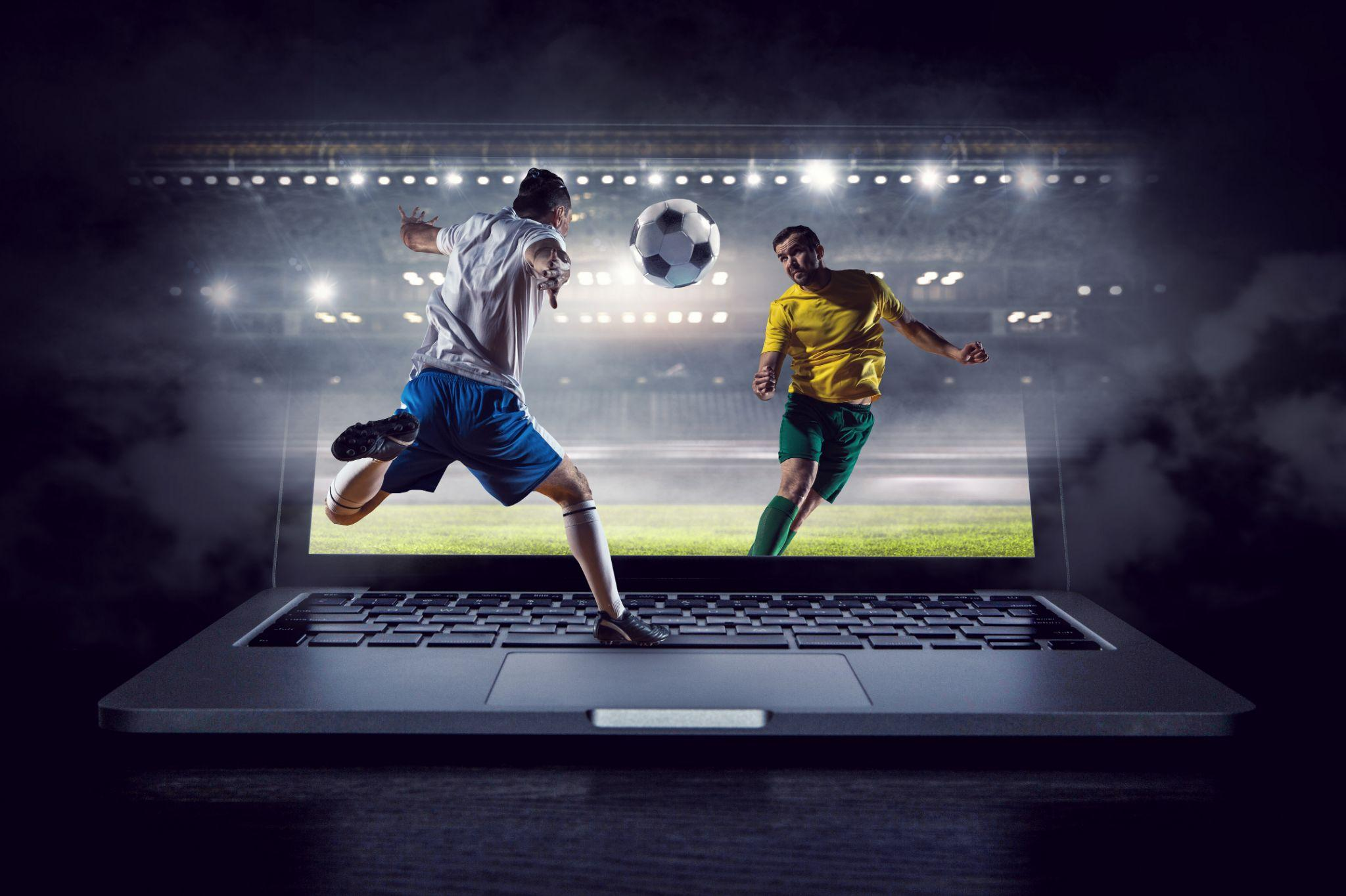 Football players on a laptop