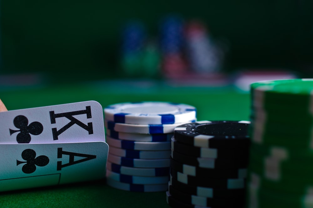 Face cards and poker chips on a gambling table