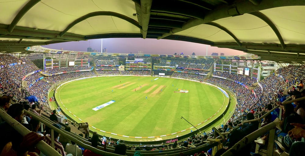 A fisheye lens shot of a cricket stadium and field
