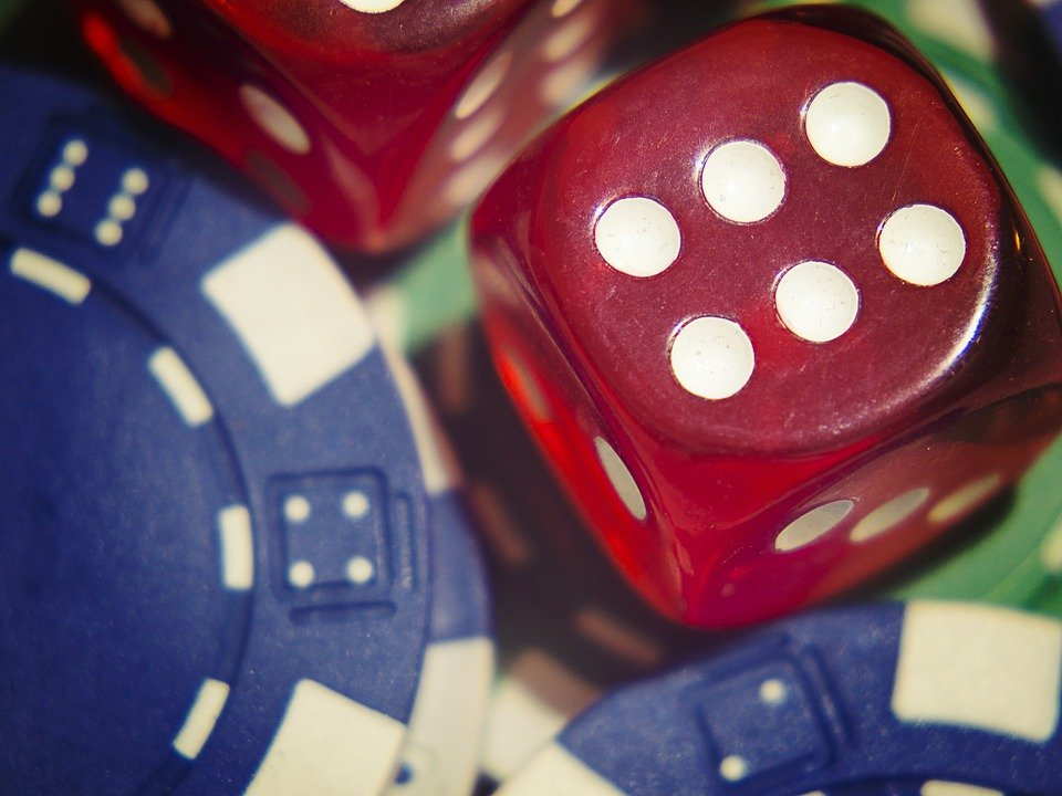 a dice and gambling chips