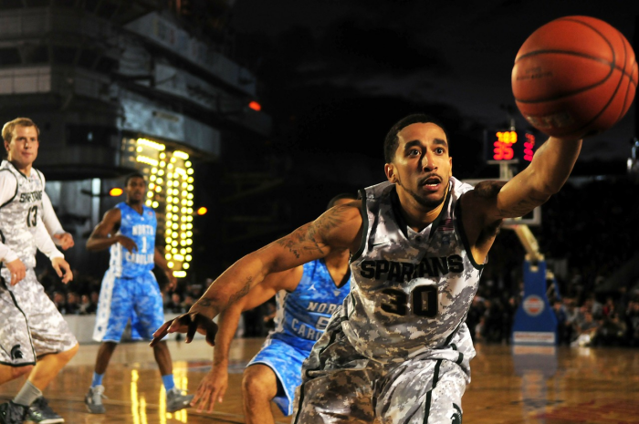 A basketball game between Michigan and North Carolina