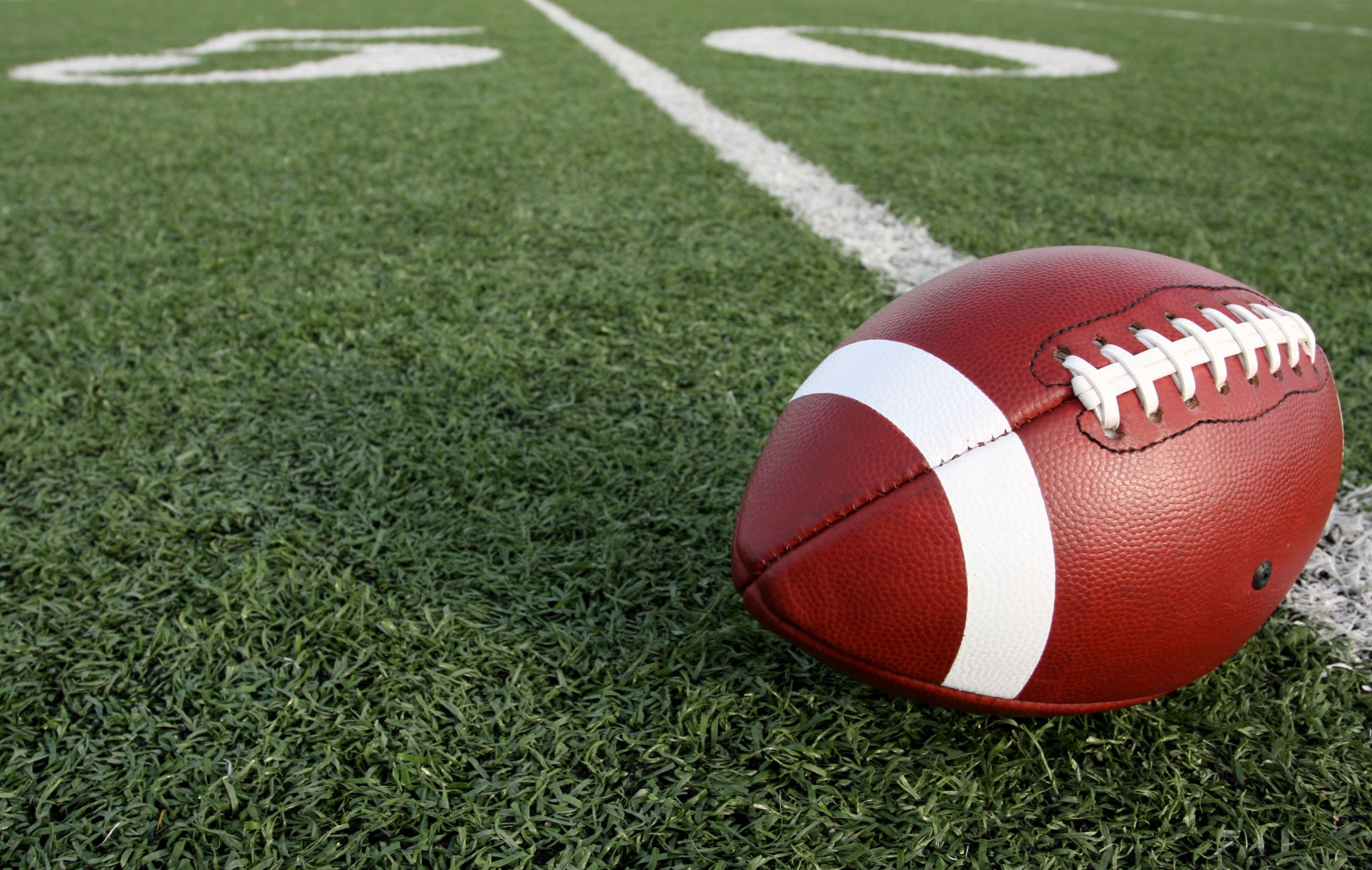 a football laying on the field