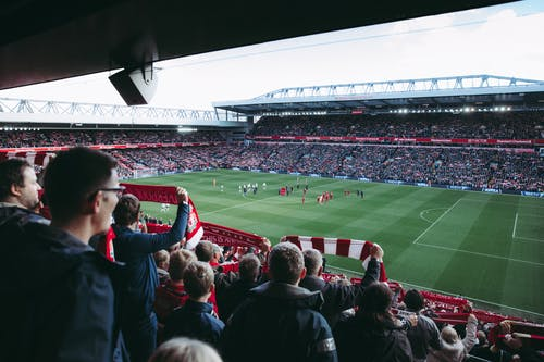 People watching football match at the stadium