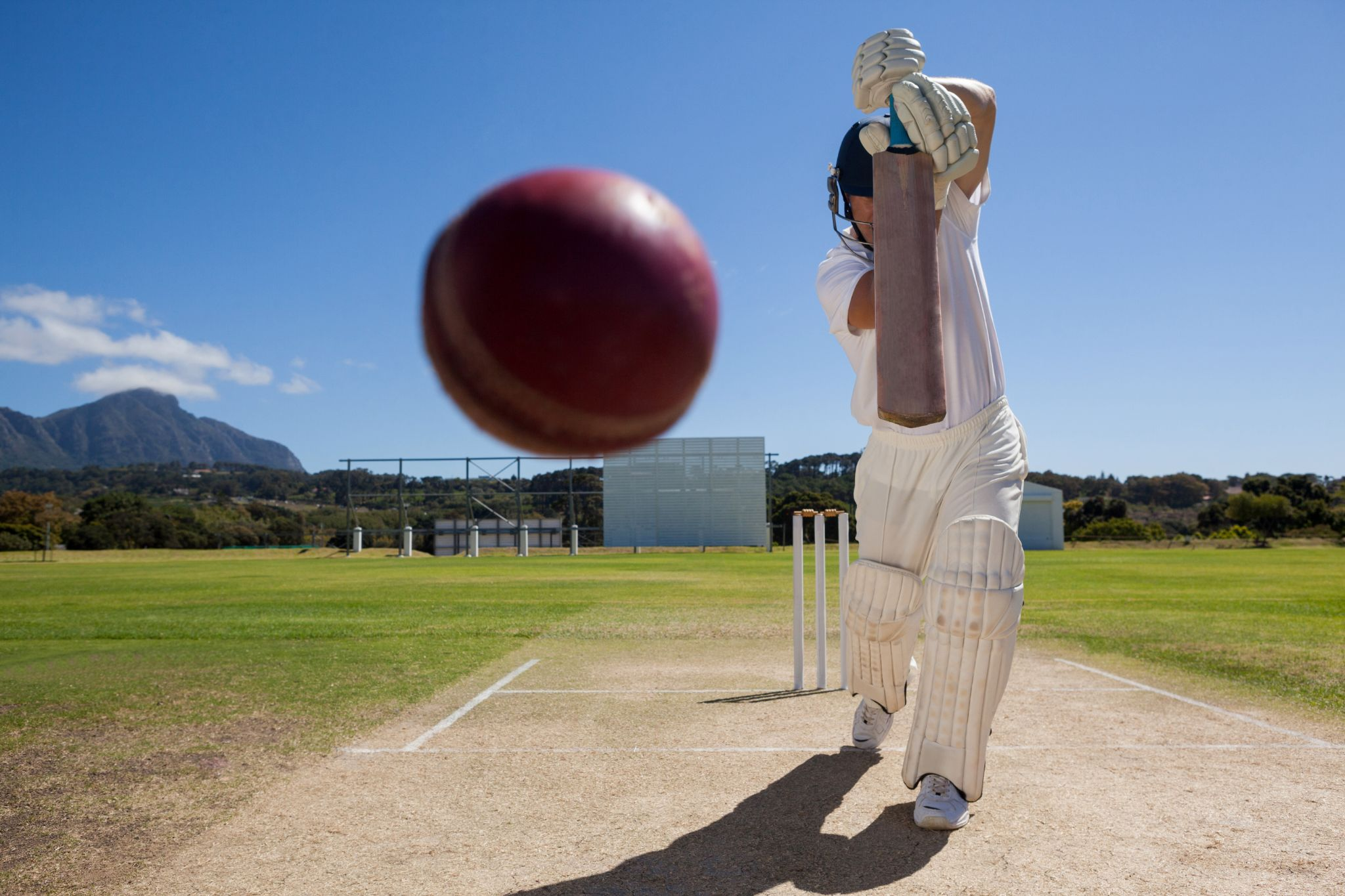 A batsman hitting the cricket ball