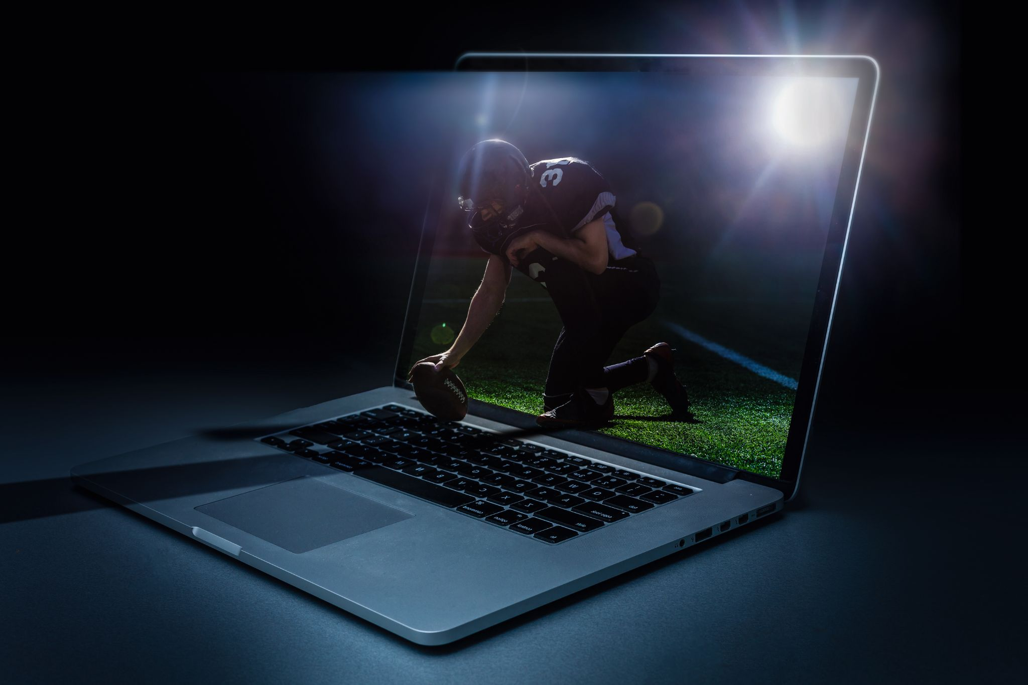 an NFL player on a laptop screen