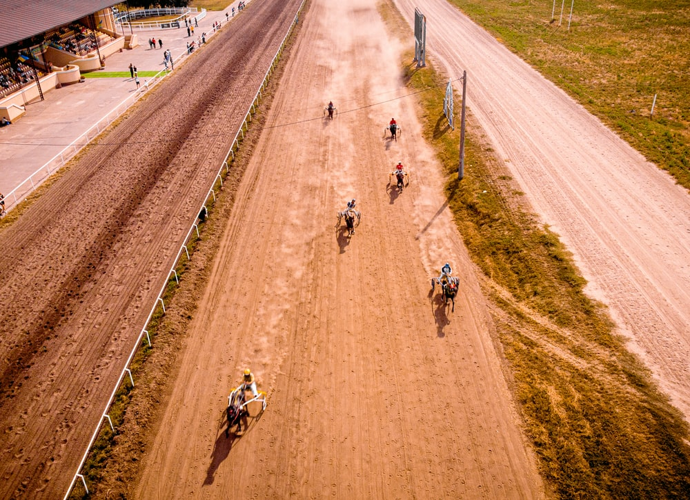 Jockeys riding their horses