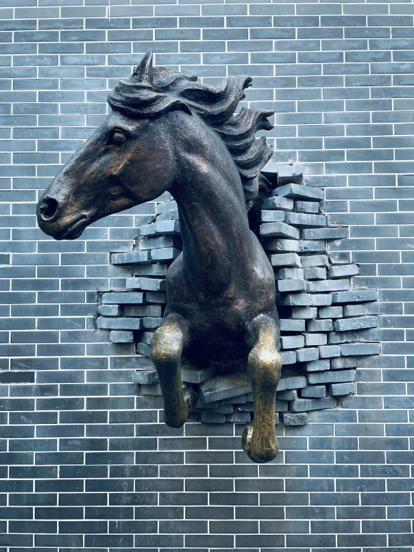 A beautiful, eye-catching statue of a running horse