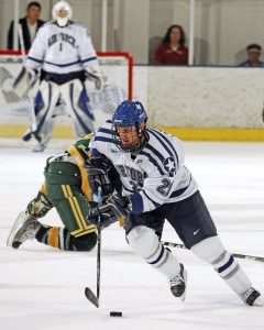 men playing ice hockey