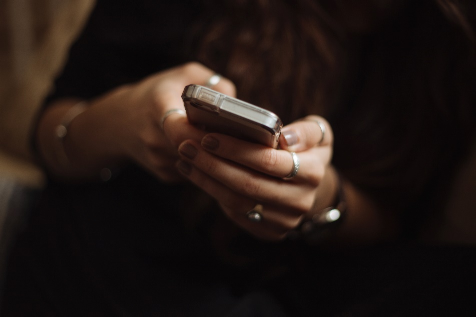 Person using a phone for online betting.