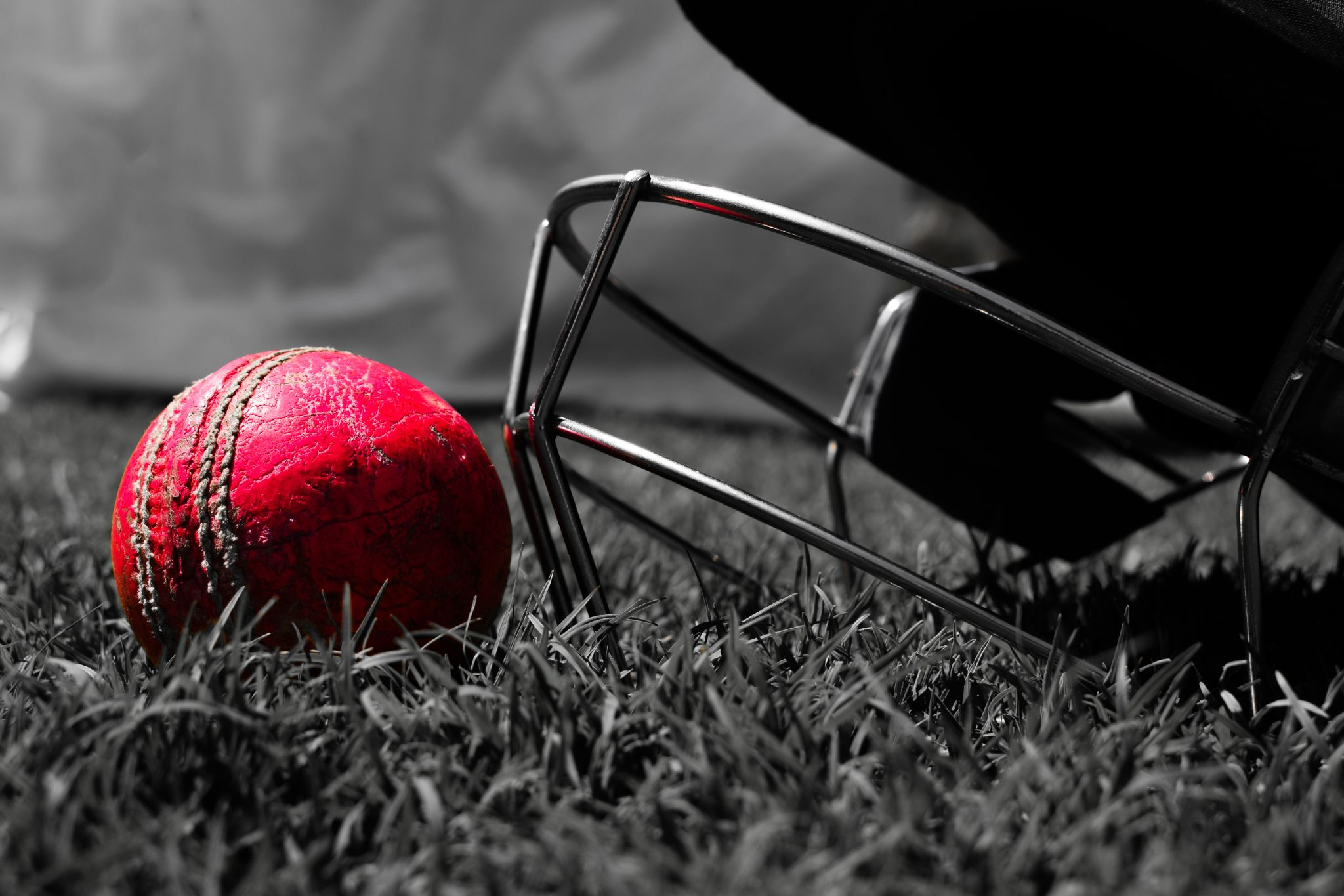 cricket ball and helmet
