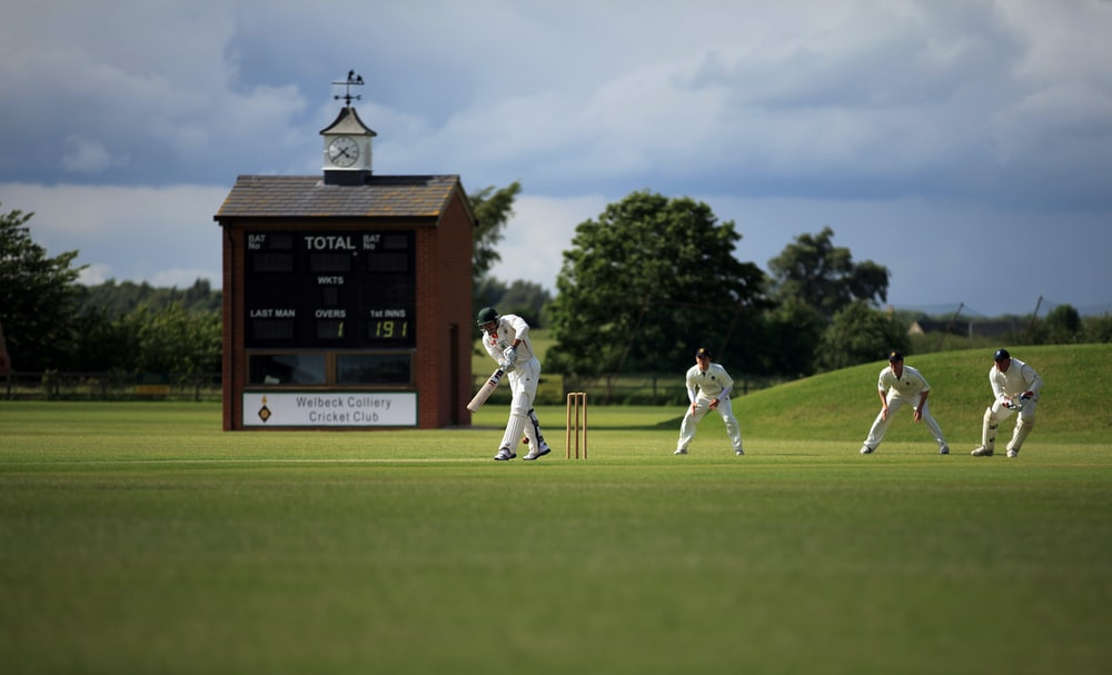 Players playing a cricket match