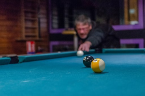 Man playing snooker