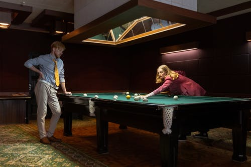 People playing snooker