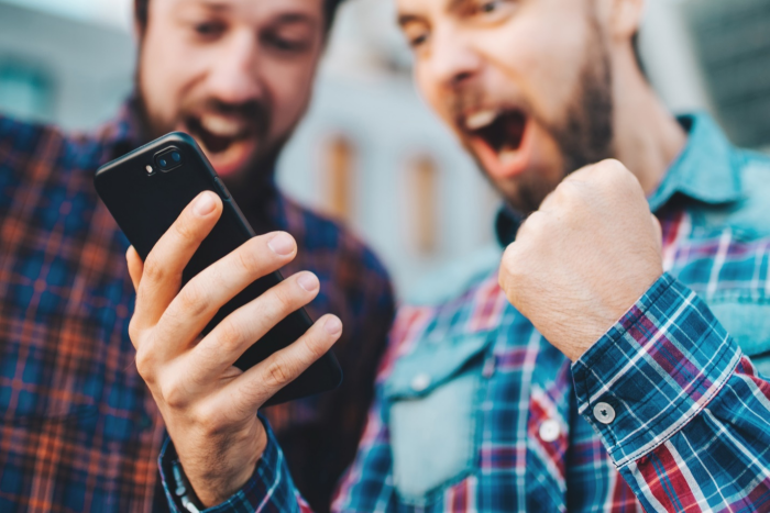 two guys on their phone