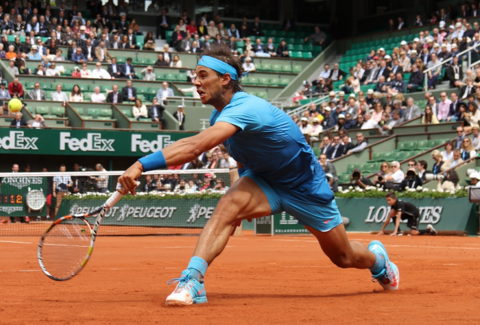 a man playing tennis
