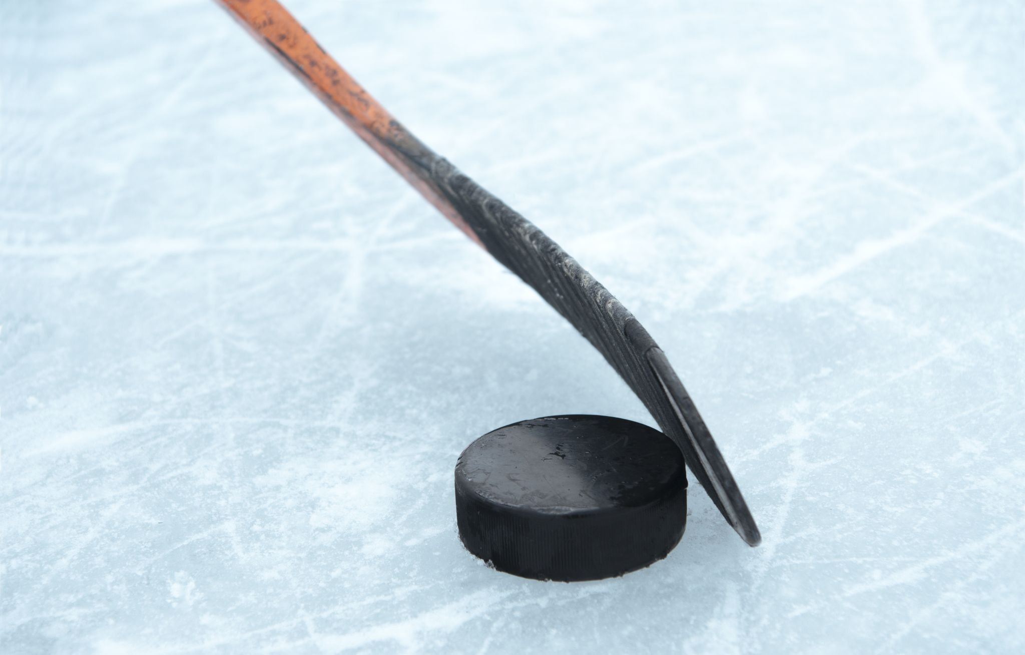 ice hockey stick with puck