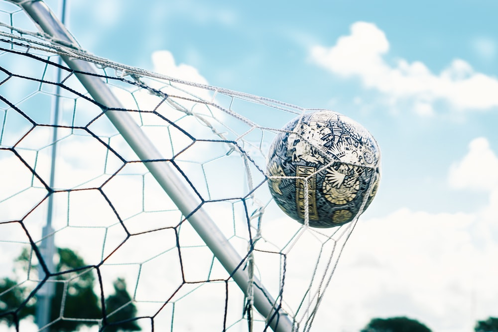 Football in a goal net