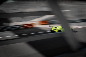 A yellow car on the track