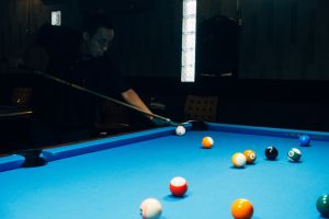 A man playing snooker