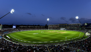 Fans enjoying cricket tournament in the stadium