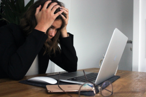 A bettor, upset after losing money online