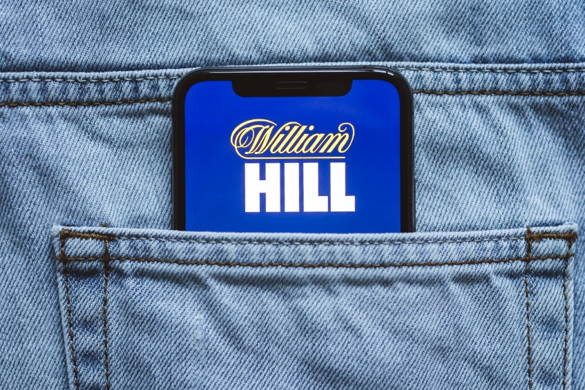 William Hill’s logo on a smartphone screen