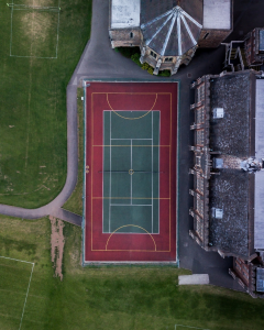 An overhead shot of a grass court.