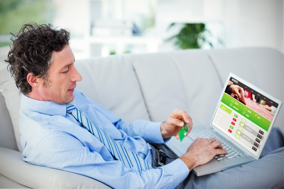 A man making online betting payments 