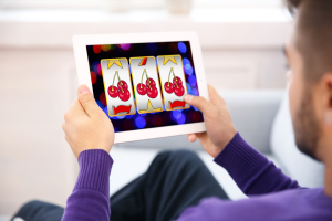 Man holding a tablet in his hand