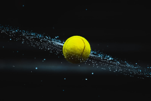 A tennis ball in the air