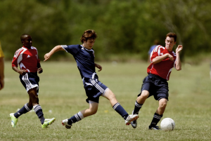 Three soccer players