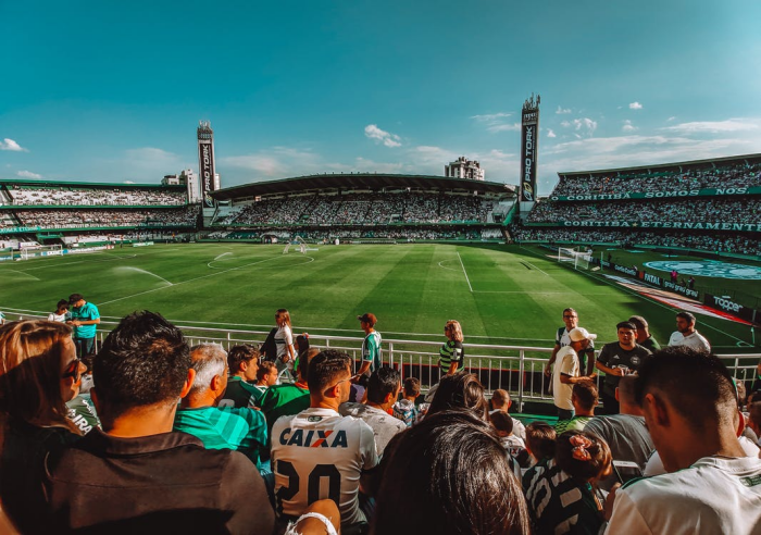 Spectators watching a football match