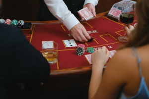 A dealer in the middle of a poker game